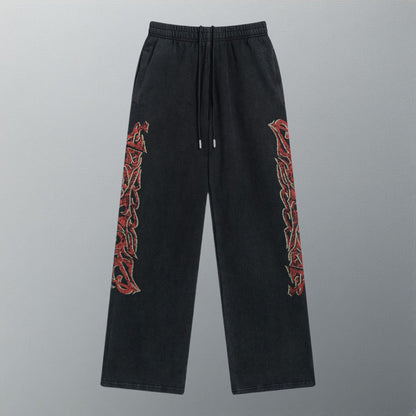 Inkjet graffiti print distressed trousers