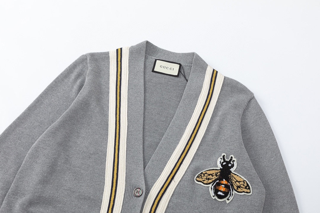 Wool cardigan with bee on chest