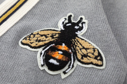 Wool cardigan with bee on chest