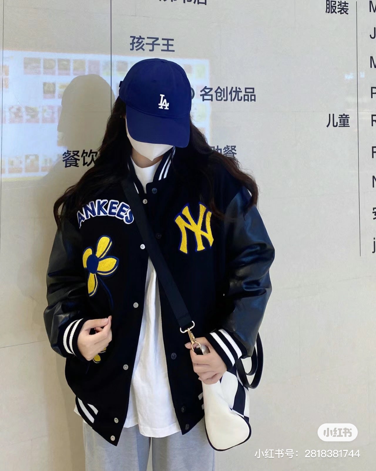 Two-color baseball jacket with small flower and letter embroidery