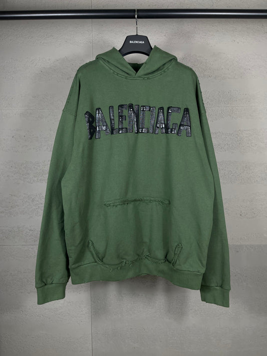 Washed and distressed hooded sweatshirt