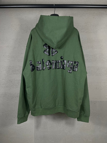 Washed and distressed hooded sweatshirt