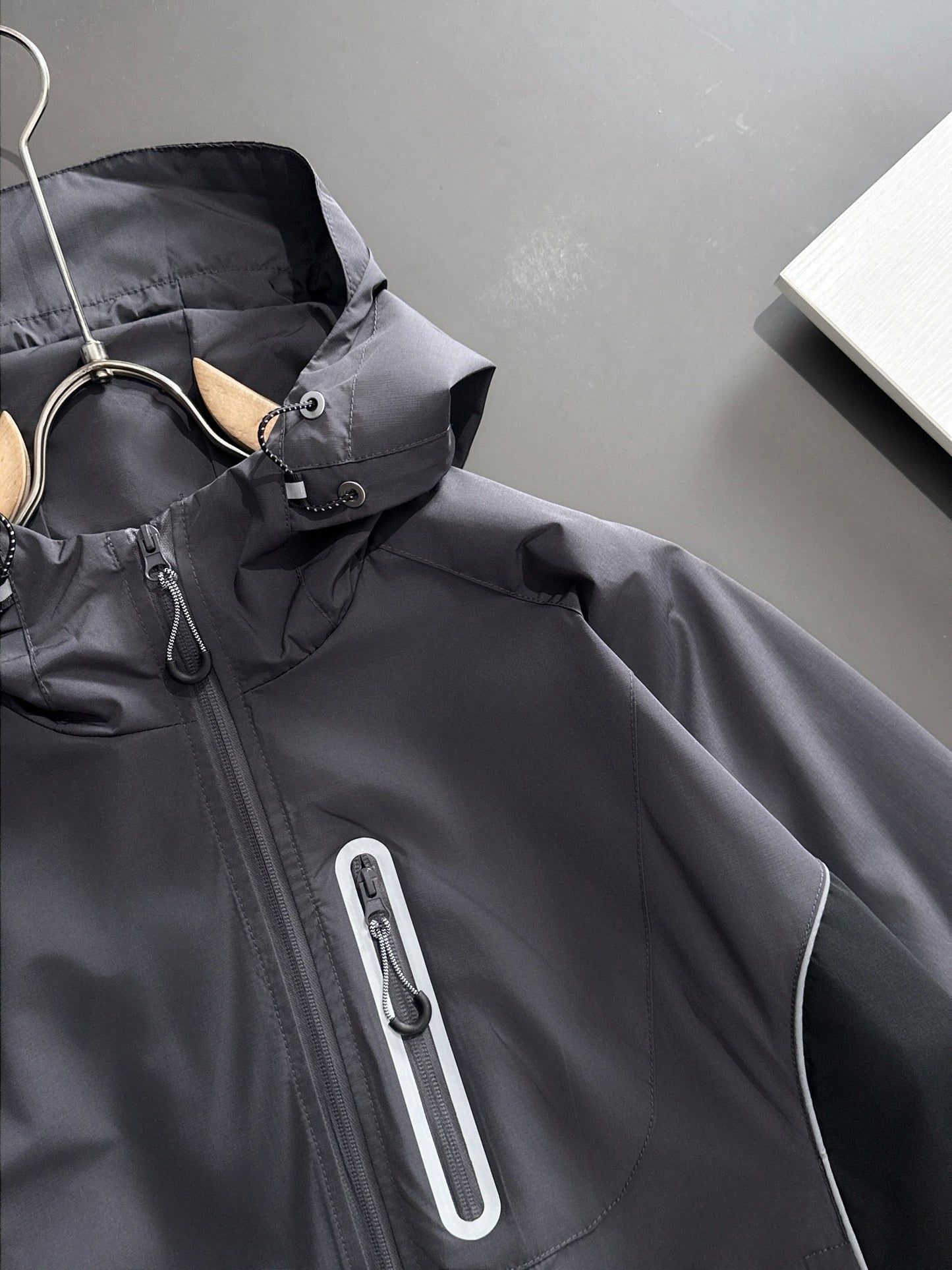 Zip-up hooded windbreaker jacket