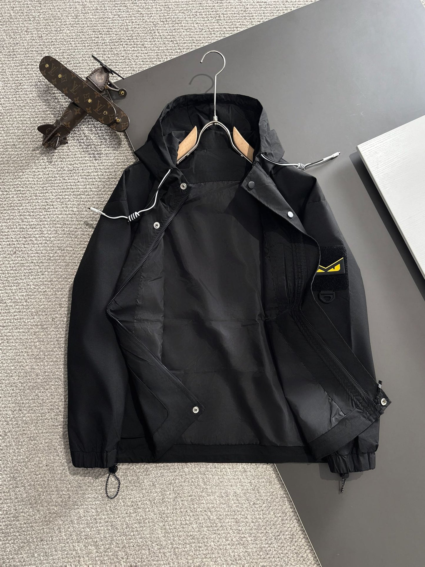 Zip-up hooded windbreaker jacket