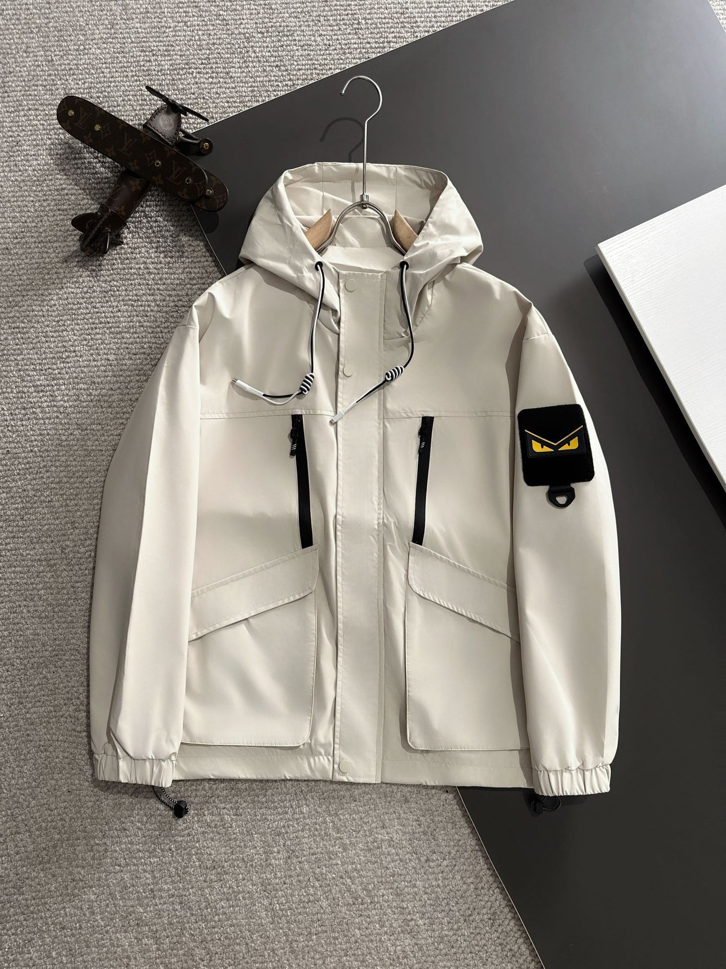 Zip-up hooded windbreaker jacket